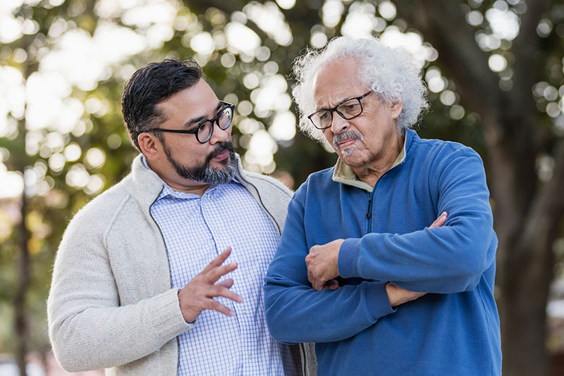 A man uses strategies for when aging parents reject assistance while talking to his elderly father about getting some help at home.