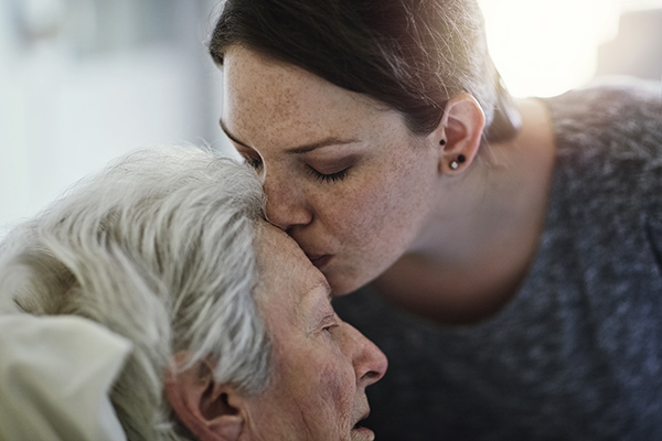 Shot of a daughter visiting her senior mother in hospital