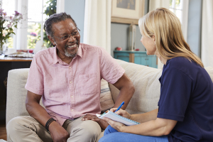 caregiver talking with senior client