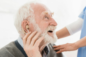 senior man wearing hearing aids