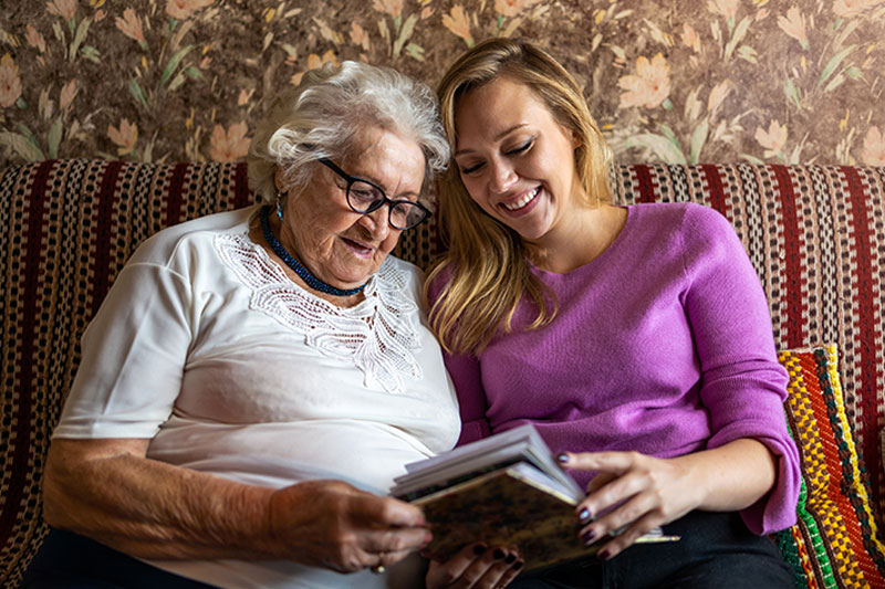 happy senior lady and caregiver