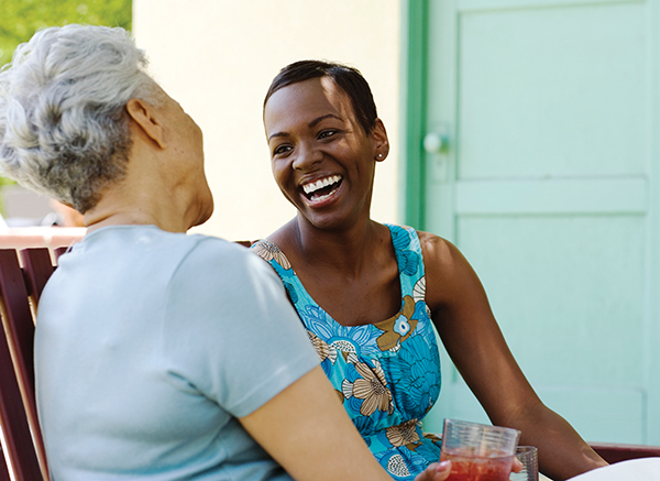 happy senior and caregiver