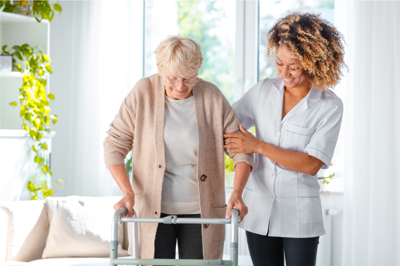 caregiver assisting senior lady
