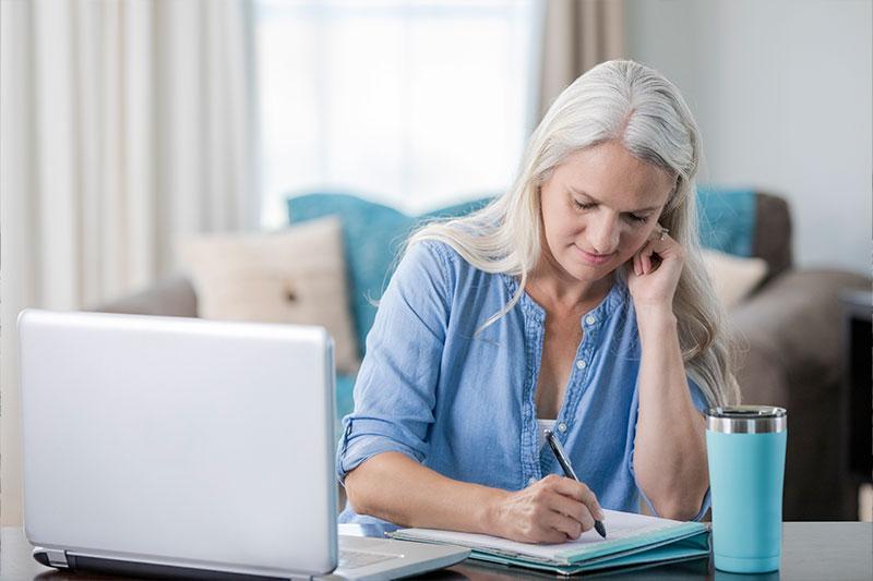 A female family caregiver creates a schedule and explores other ways to improve her time management in caregiving.