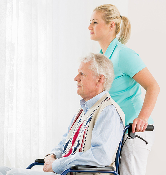 caregiver with older man with ALS